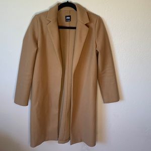 Camel colored long pea coat with pockets